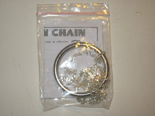 Ring chain magic trick - on,
